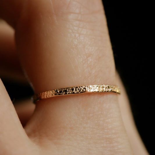 Textured gold ring band