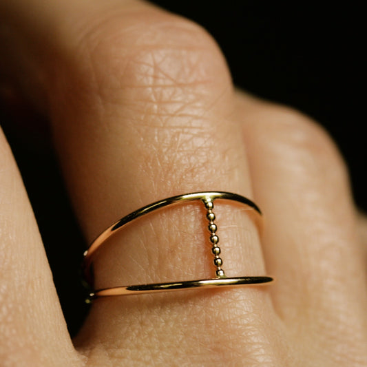 gold cage ring