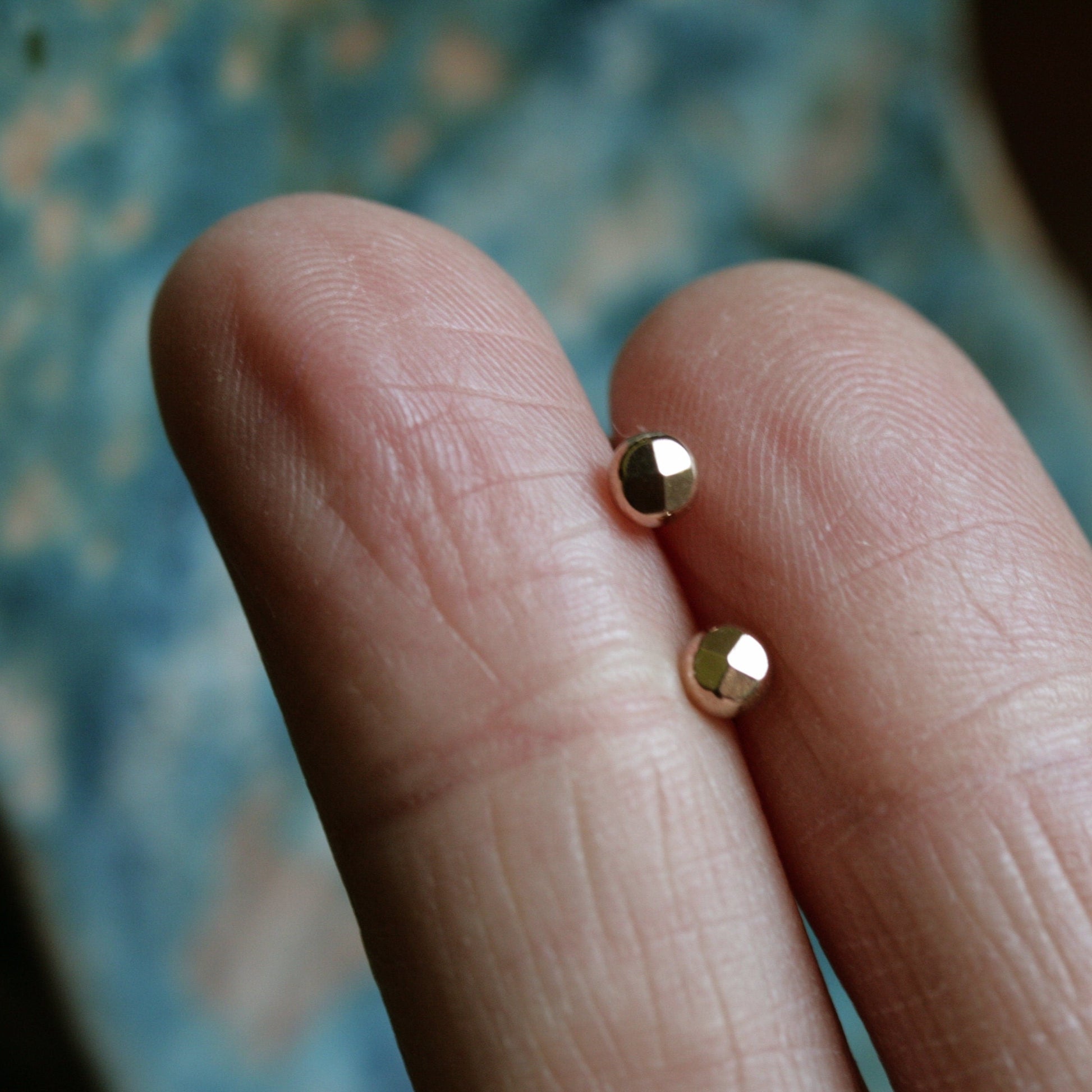 tiny gold studs