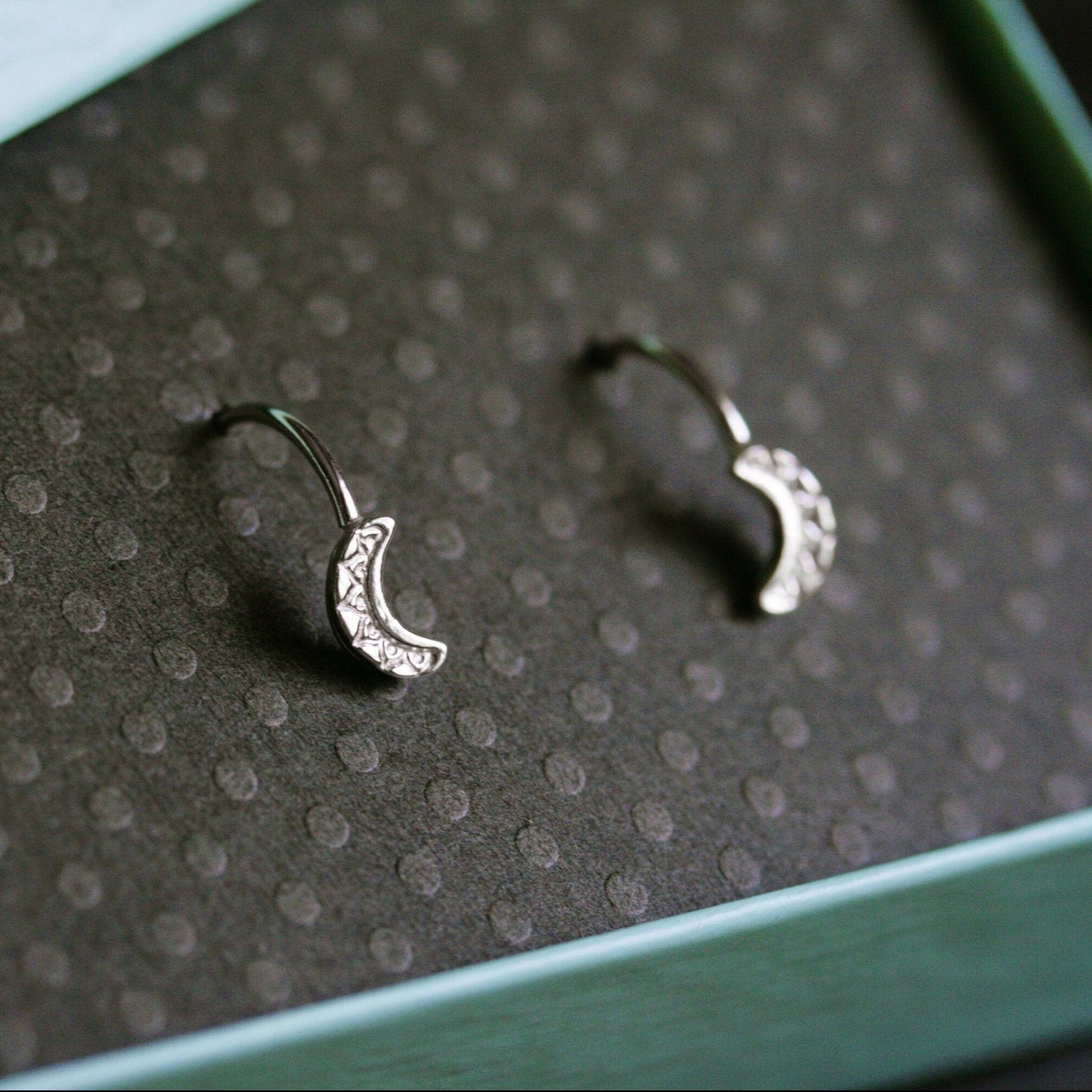 handmade silver hoop earrings with stamped moons